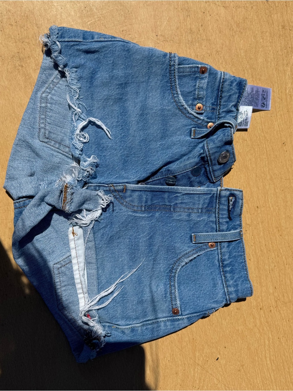 Levi's Medium Blue Distressed High-Rise Denim Cutoff Shorts
